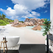 Rocks on tropical beach wall mural image 0