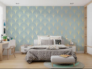 Bedroom with geometric wallpaper, bed, and desk.