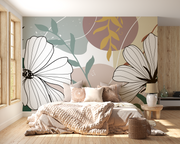 Bedroom with floral wall mural and soft lighting