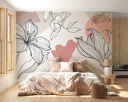 Bedroom with floral wall mural and wooden flooring