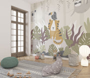 Children's room with a wall mural of a tiger and plants, featuring a rug, ottoman, and decorative items.