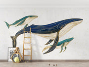 Line art whale mother with children wall mural decorating a kids' room.