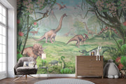Jurassic Dinosaur Wall Mural – Realistic Prehistoric Scene with Brachiosaurus, Triceratops, and Velociraptors in a Lush Green Landscape for Kids' Rooms.