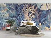 Bedroom with a large mural of a leopard and foliage on the wall.