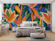 Vibrant Tropical Flower and Leaf Wall Mural – bedroom with patterned bedding mock-up