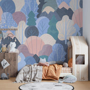 Pastel Woodland Trees and Mountains Wall Mural – child’s bedroom with a house-shaped bed mock-up