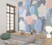 Pastel Woodland Trees and Mountains Wall Mural – playroom with floor cushions mock-up