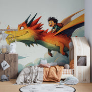 Children's room with a dragon and boy mural on the wall.