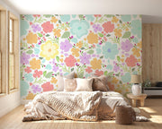 Pastel Watercolour Flower Pattern Wall Mural – bedroom with a pale upholstered bed mock-up