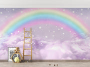Pastel Rainbow Clouds and Stars Wall Mural – playroom with a wooden ladder and books mock-up
