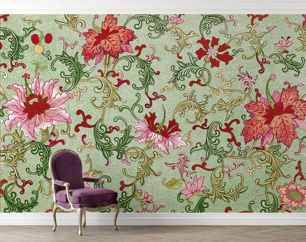 Decorative wallpaper with floral pattern and a purple chair in front.