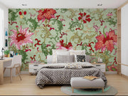 Bedroom with floral wallpaper and patterned bedding