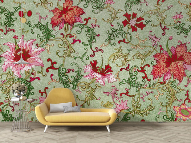 Yellow sofa in front of a wall with colorful floral wallpaper