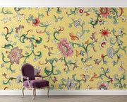 Decorative floral wallpaper with a purple chair in front