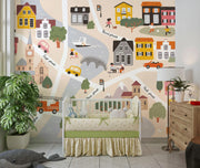 Children's room with a crib, cityscape wall mural, and decorative elements.