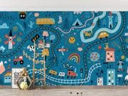 Children's mural with colorful road, vehicles, and animals on a blue background