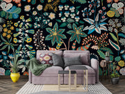Living room with a gray sofa against a vibrant floral wall mural.