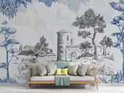 Sofa with decorative pillows against a wall with artistic landscape mural