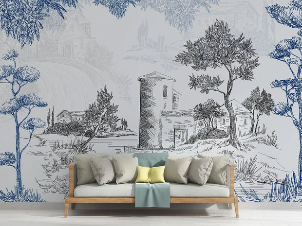 Sofa with decorative pillows against a wall with artistic landscape mural