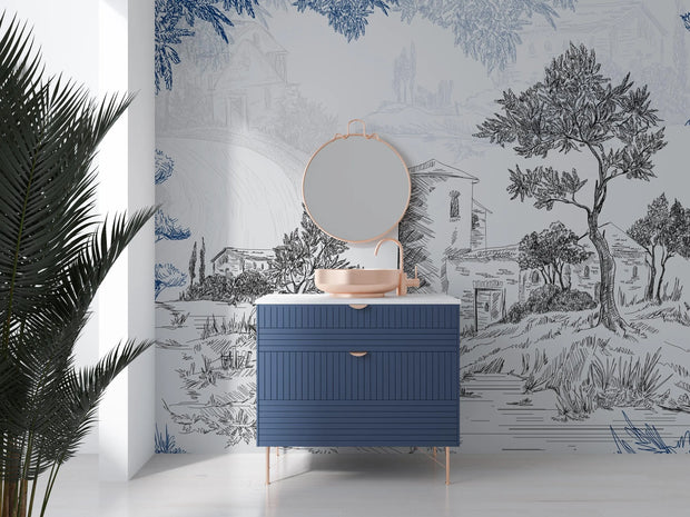 Blue dresser with round mirror against a decorative wallpapered wall
