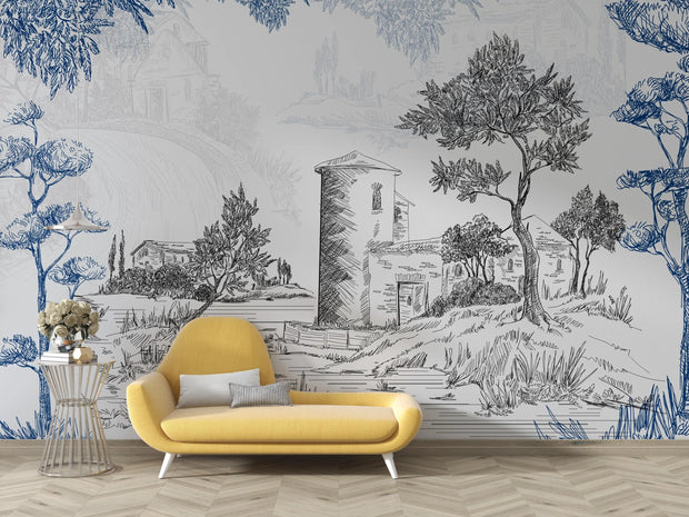 Yellow sofa in front of a wall with blue and white landscape mural