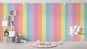 Children's room with pastel striped wall, shelves, and swing.