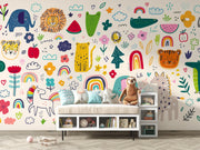 Children's room with colorful animal-themed wallpaper and furniture.