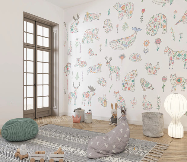 Children's room with animal-themed wallpaper, bean bag, and rug.