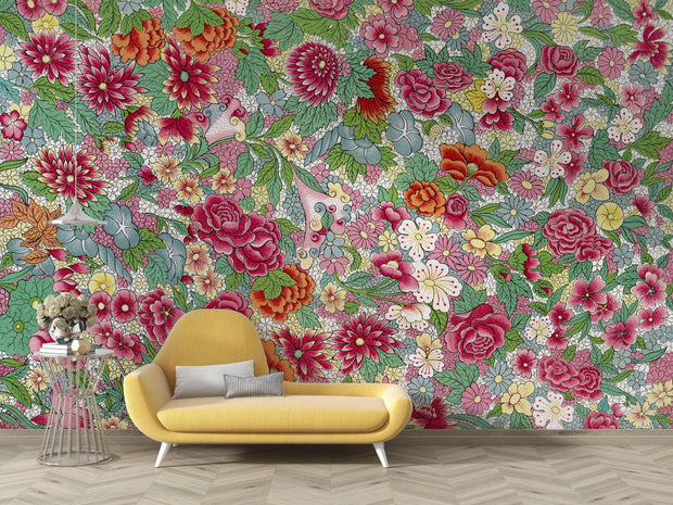 Living room with colorful floral wallpaper.