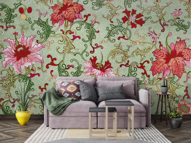 Living room with a floral wallpaper, gray sofa, and decorative elements.