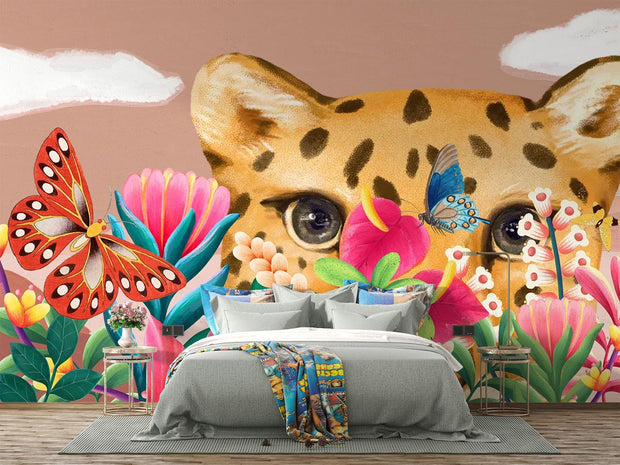 Room interior with a large wall mural of a cheetah's face surrounded by flowers and butterflies.