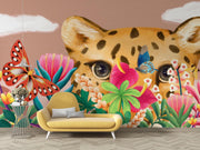 Wall mural with a cheetah, butterflies, and tropical plants in a colorful setting.