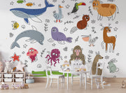 Children's room with a colorful animal wallpaper and a small table and chairs.