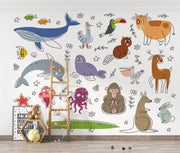 Children's room with a wall featuring cartoon animals and a wooden ladder.
