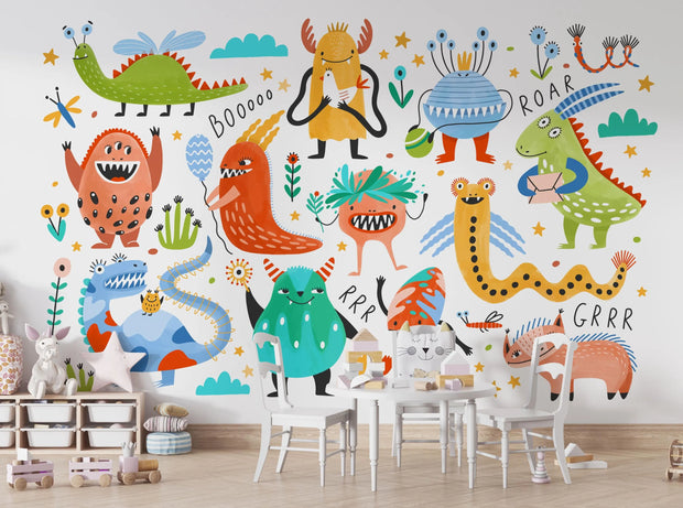 Colorful children's mural of monsters and dinosaurs in a room with furniture.