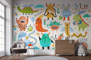 Children's room with colorful monster mural on the wall.