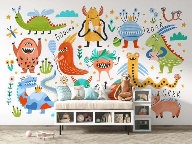 Children's room with colorful monster wall mural and furniture.