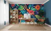 Colorful tropical wall mural in a home office with a desk, chair, and bookshelf.