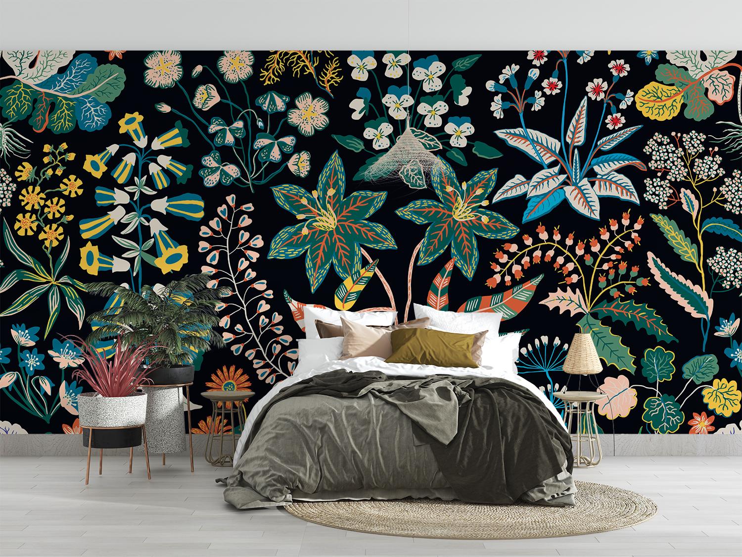 Bedroom with a colorful floral wall mural on a black background