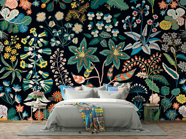 Bedroom with floral wallpaper featuring various plants and flowers on a dark background.