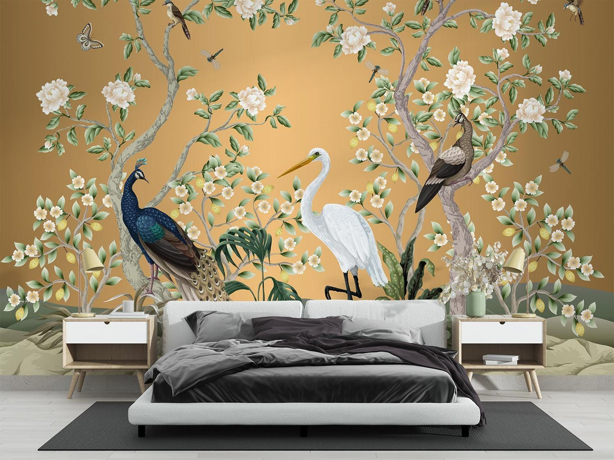 Golden Chinoiserie wall mural with peacocks, egrets, flowering trees and birds