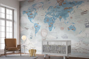 Blue Vintage Travel World Map Wall Mural – nursery with a cot mock-up