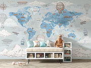 Blue Vintage Travel World Map Wall Mural – child’s room with a cushioned storage bench mock-up
