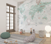 Sage Green Vintage Travel World Map Wall Mural – playroom with floor cushions mock-up