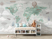Sage Green Vintage Travel World Map Wall Mural – child’s room with a cushioned storage bench mock-up