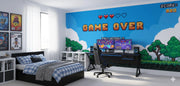 Gaming room with 'Game Over' wall design and gaming setup.