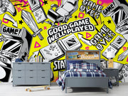 Children's bedroom with gaming-themed decor, including a bed, dresser, and wall mural with gaming graphics.