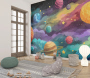 Colorful space-themed mural in a room with toys and decor.