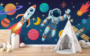 Children's room with space-themed wallpaper, toys, and a teepee.