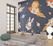 Children's room with space-themed wallpaper featuring animals on a rocket and planets.